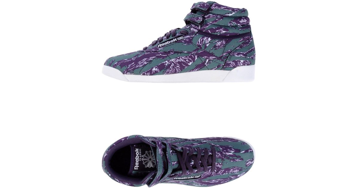 purple reebok high tops