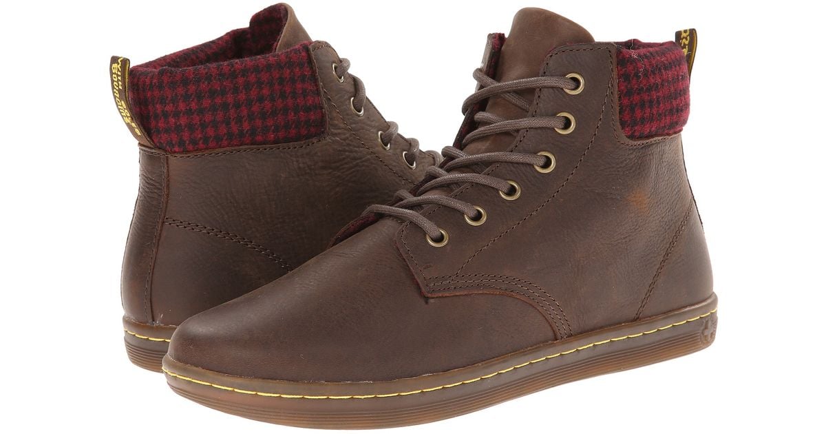 dr martens maelly boots Cinosural International School