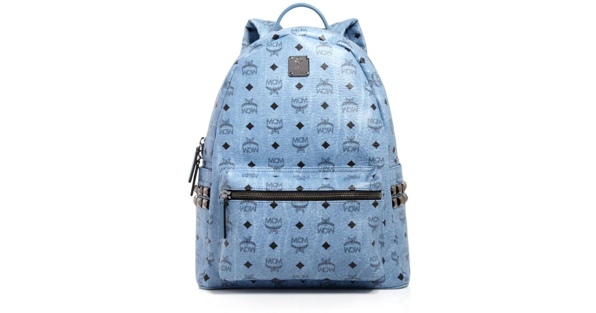 blue mcm backpack with studs