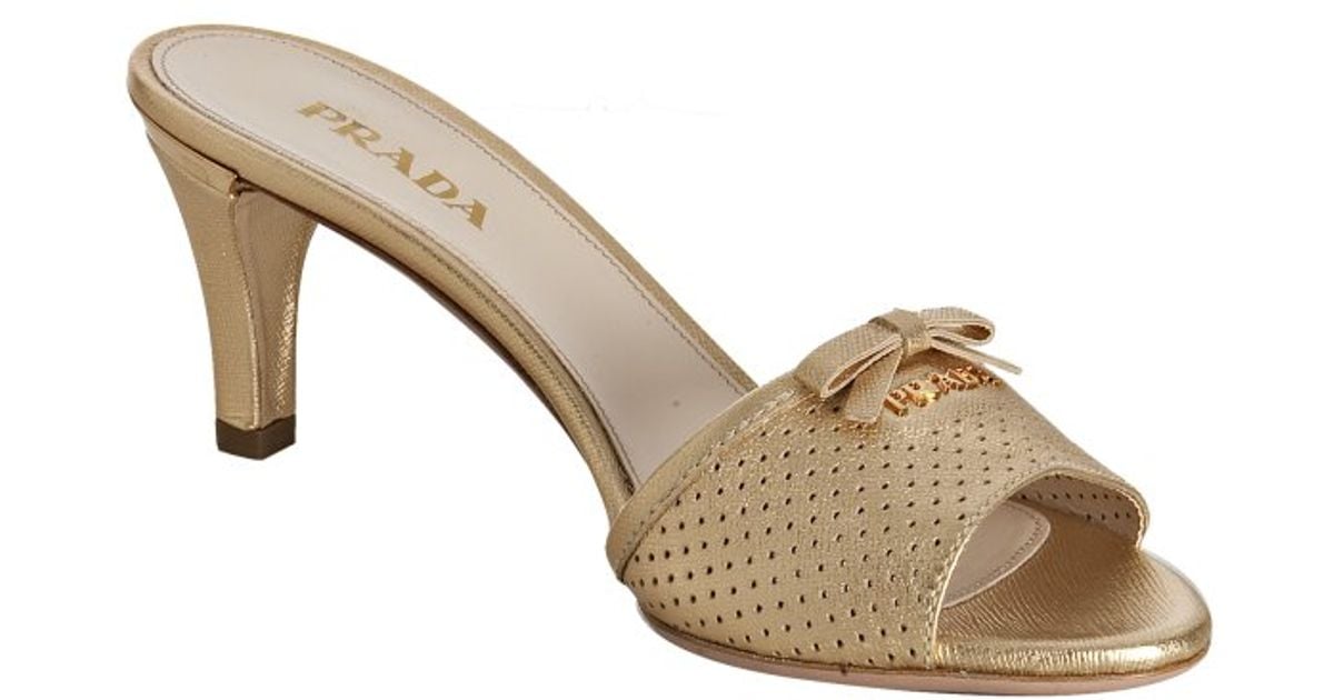Lyst - Prada Gold Perforated Saffiano Bow Slide Sandals in Metallic