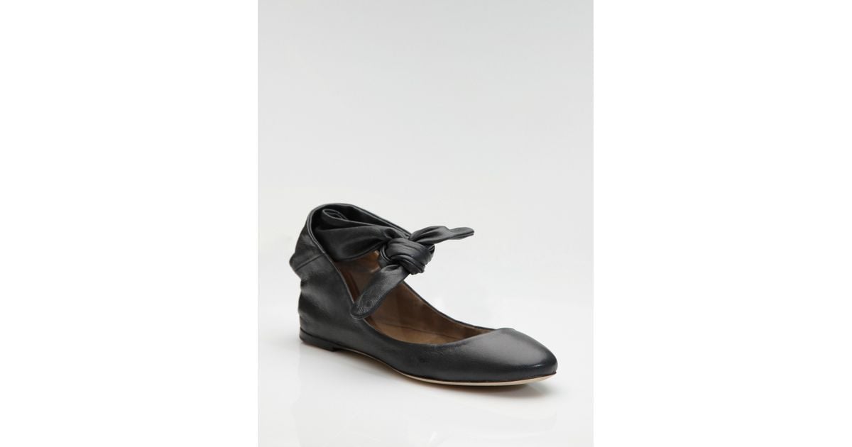 black ankle wrap flats