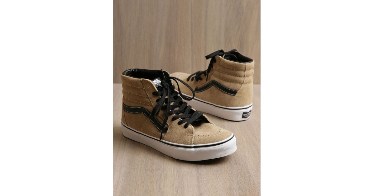 brown and tan vans