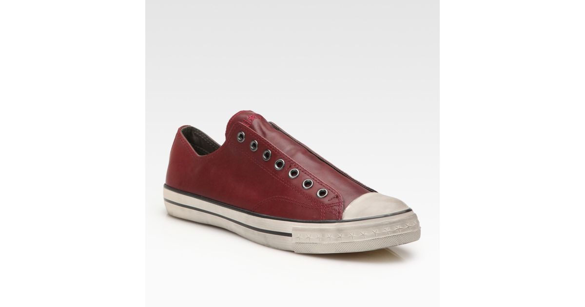 red laceless converse