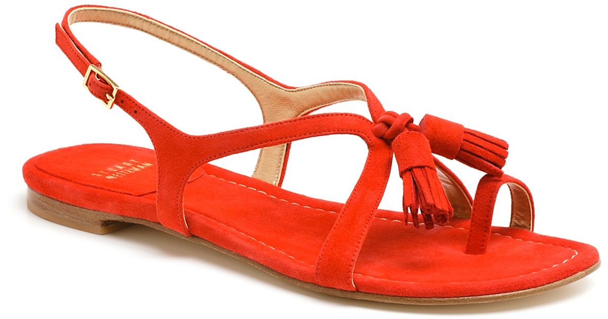 red sandals with tassels
