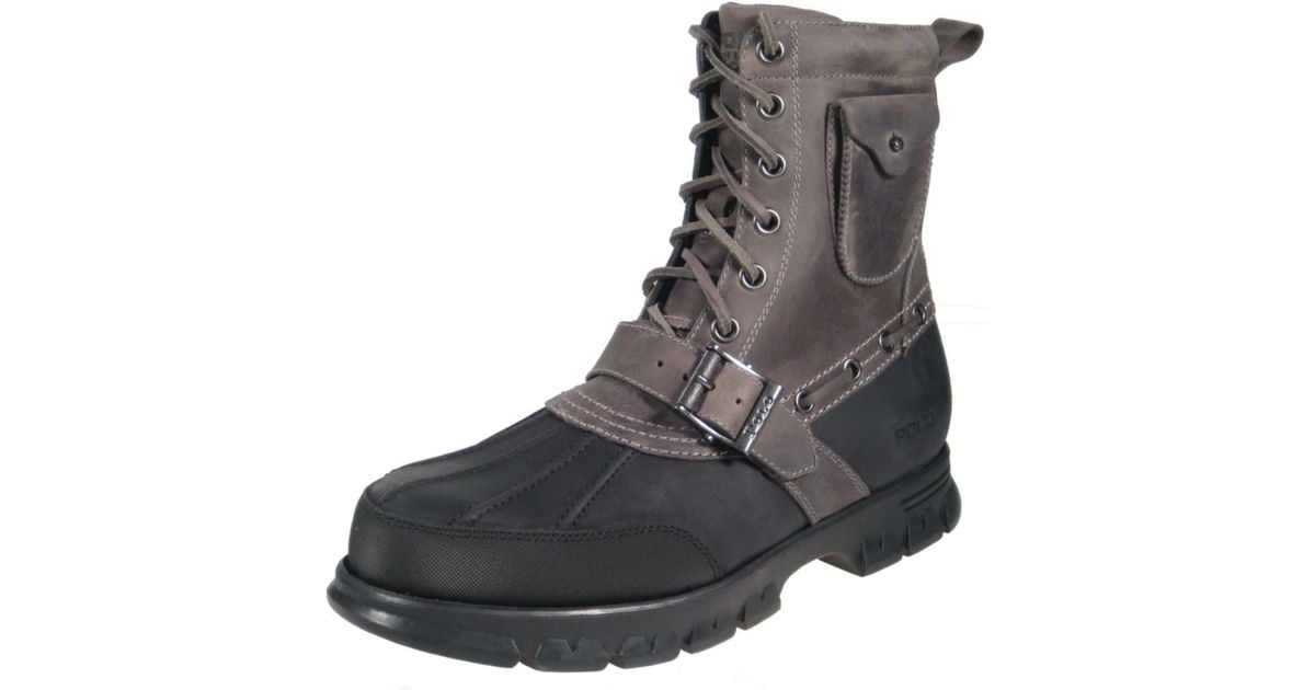 grey and black polo boots