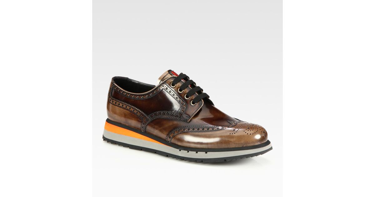 prada wingtip sneakers