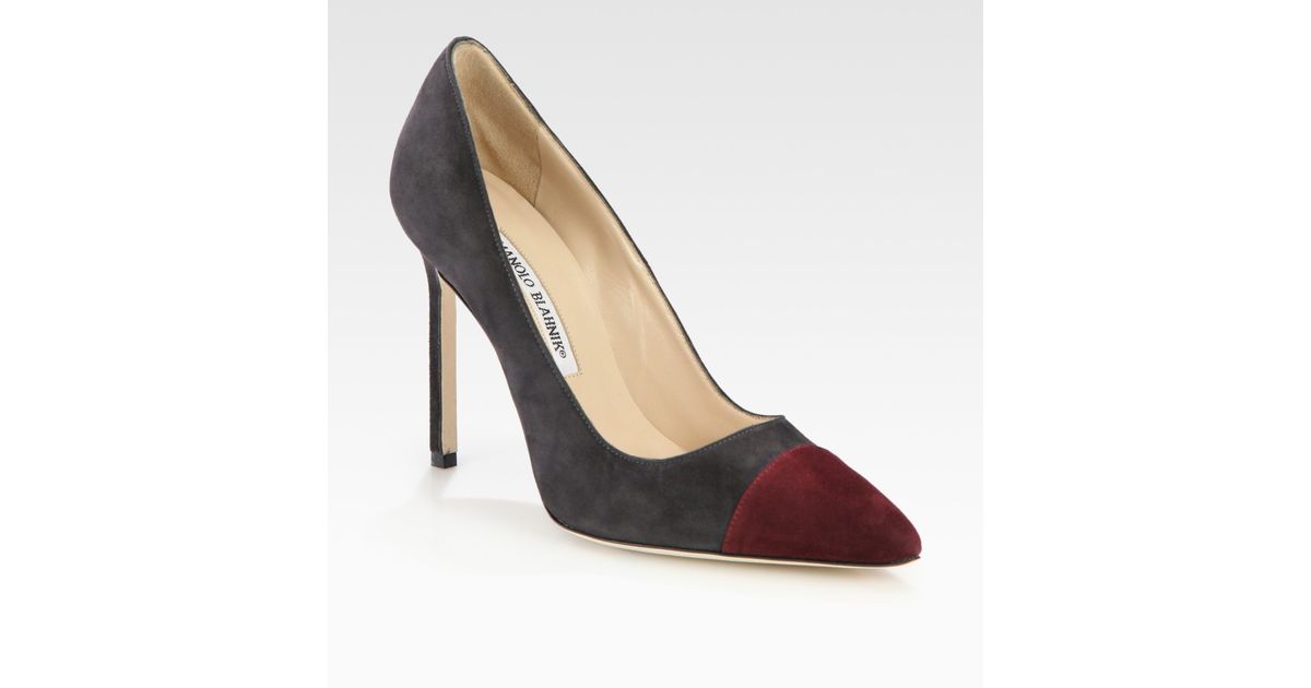 black pumps with white cap toe