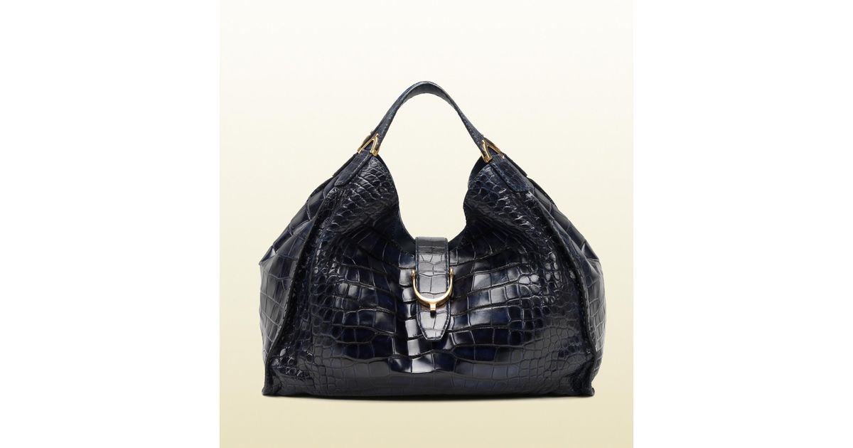 soft stirrup light pink crocodile shoulder bag