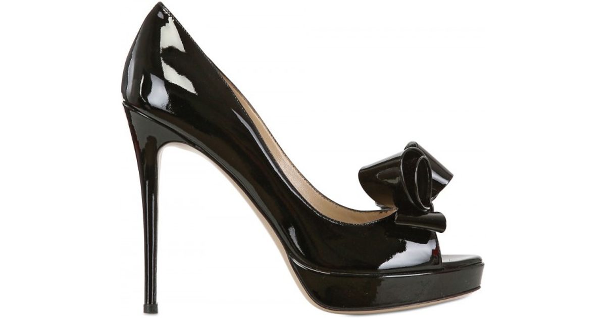 black patent leather peep toe pumps