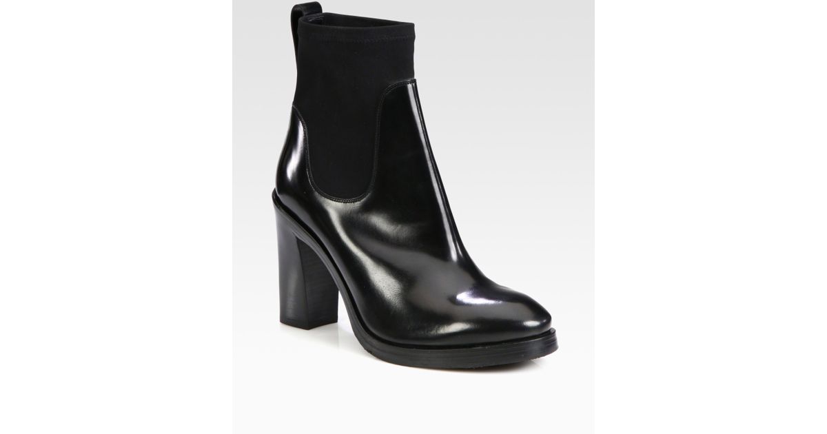 shiny black leather ankle boots