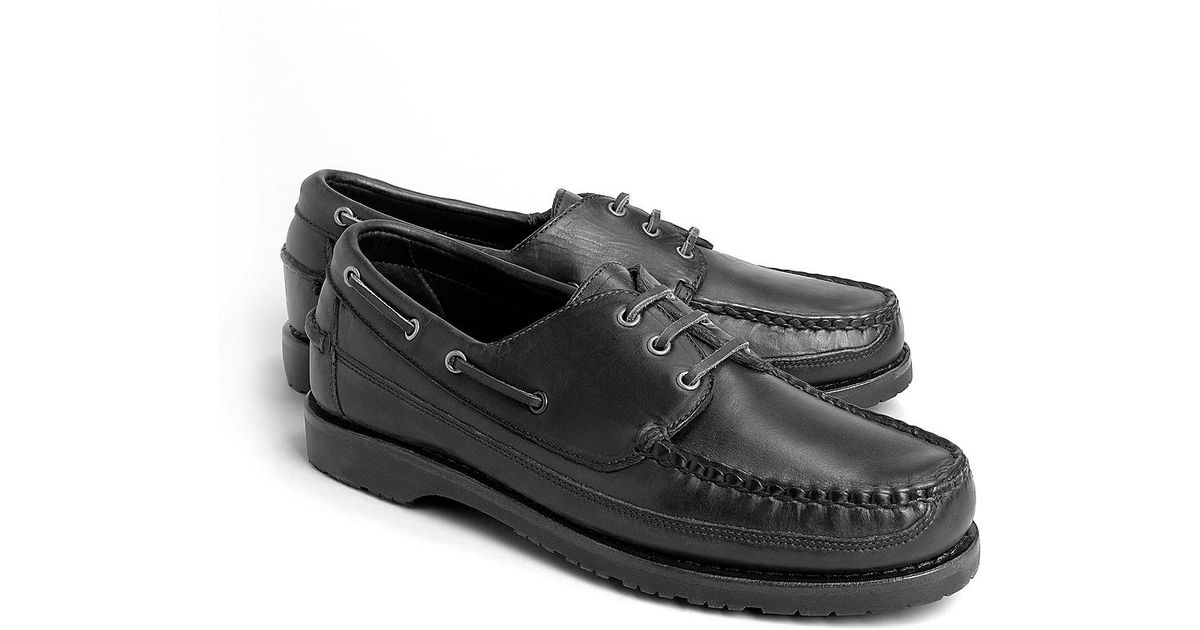 white sole boat shoes