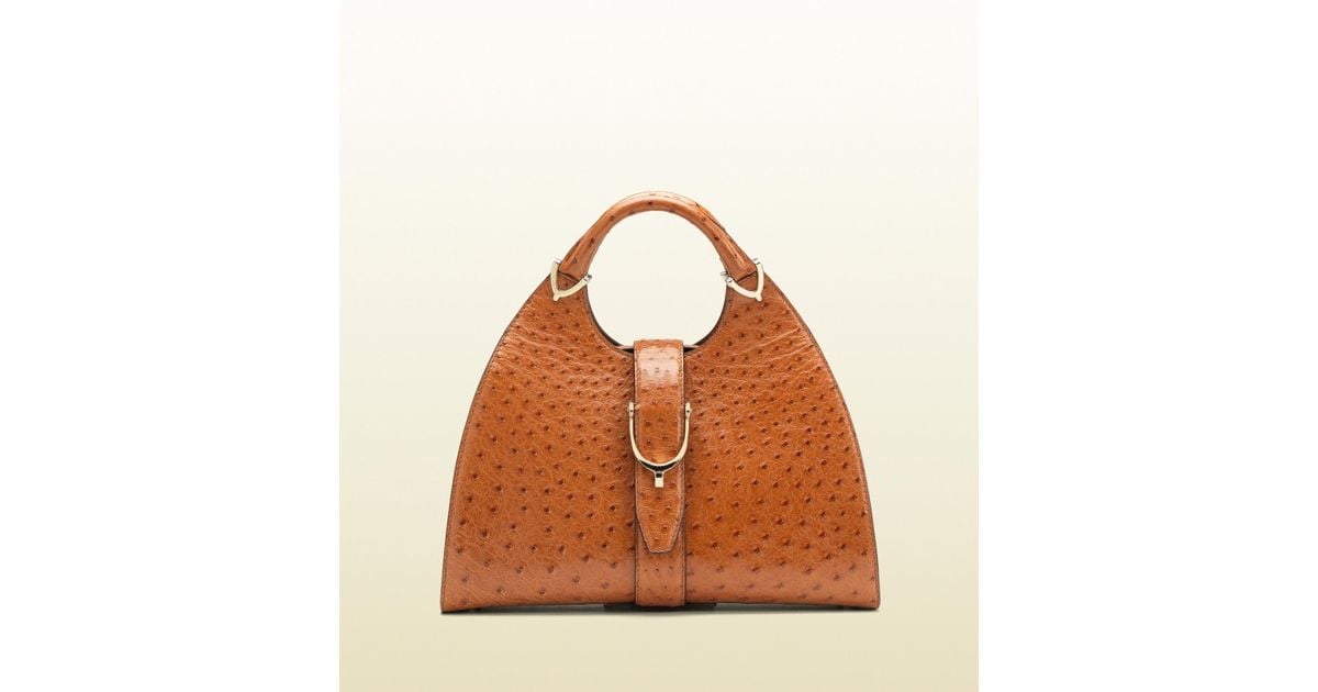 gucci stirrup top handle bag