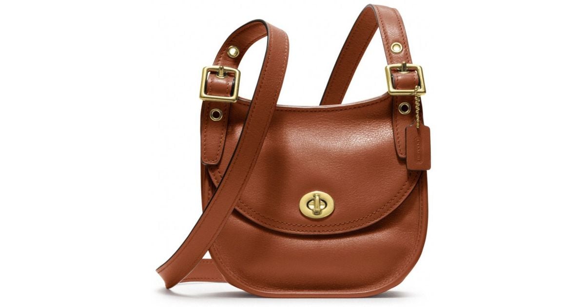 COACH Legacy Leather Mini Saddle Bag in Brown