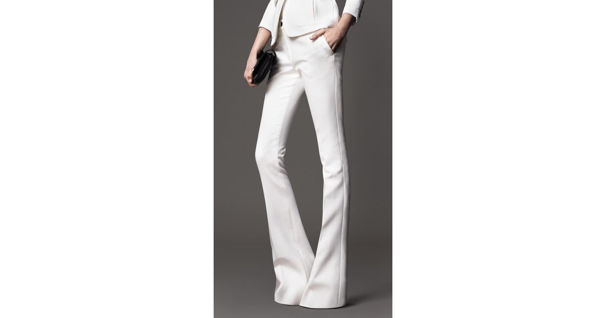white flared trousers
