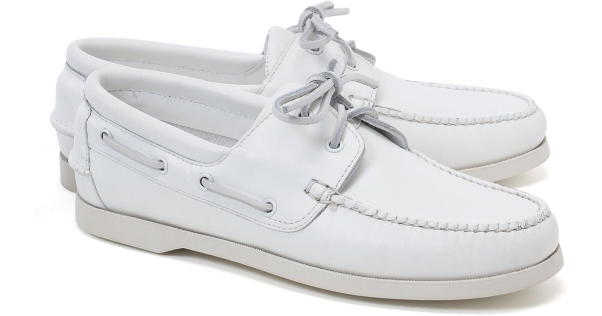 black and white boat shoes