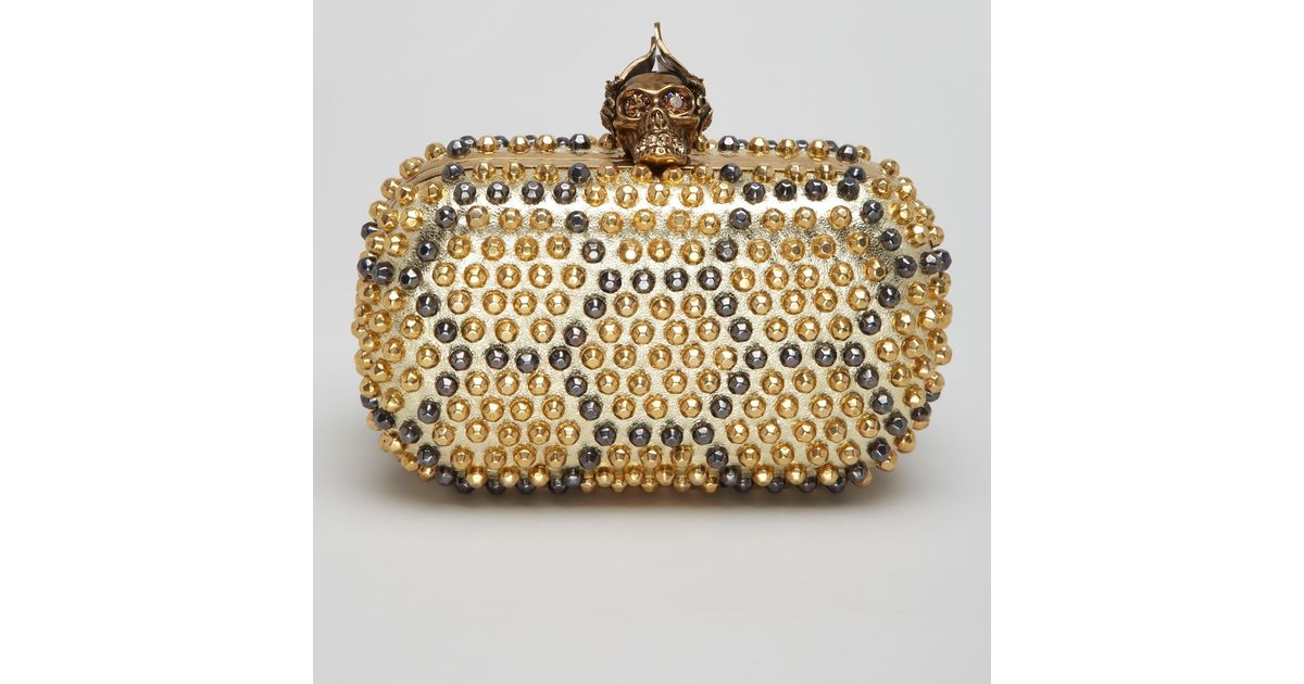 gold studded clutch