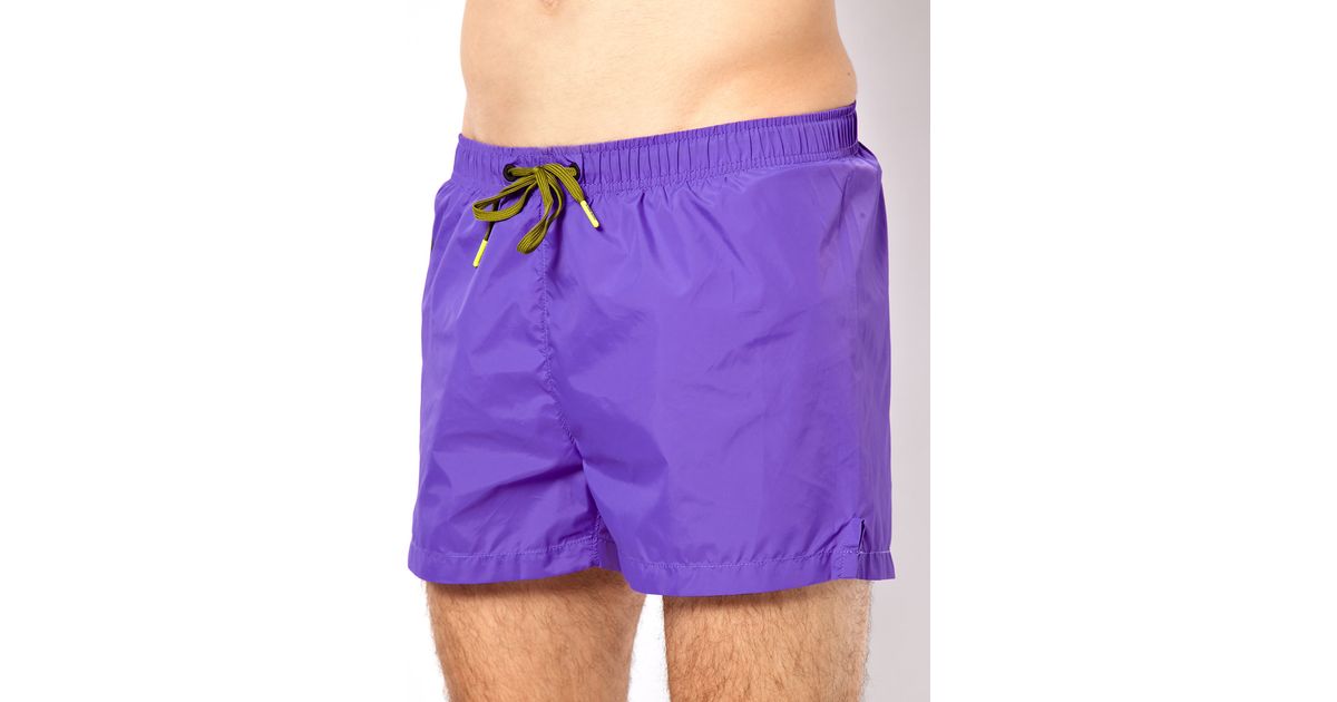 purple swimming shorts