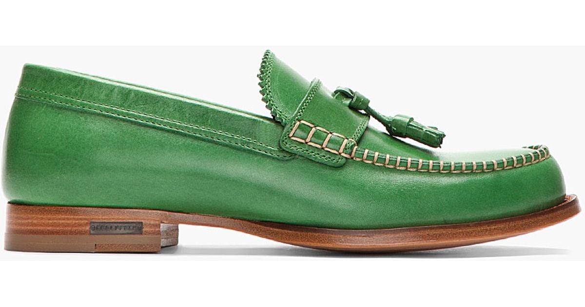 green penny loafers