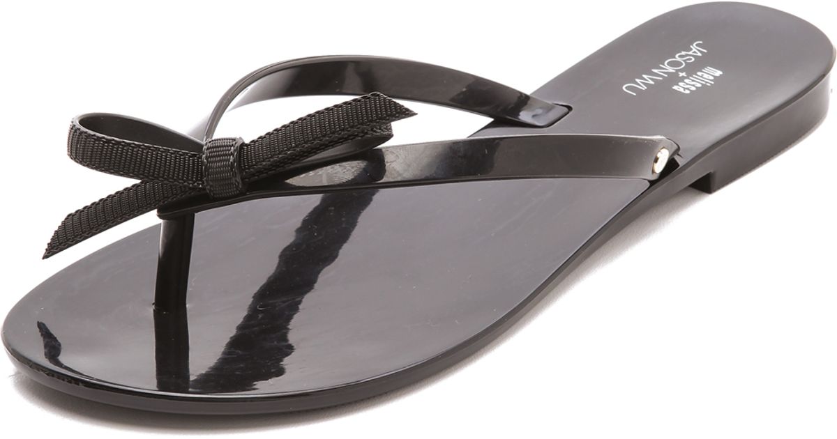 melissa black bow flip flops