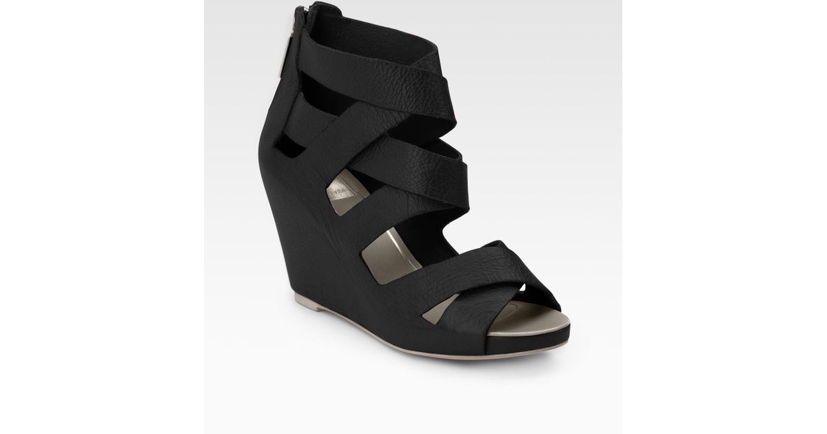 black criss cross wedge sandals