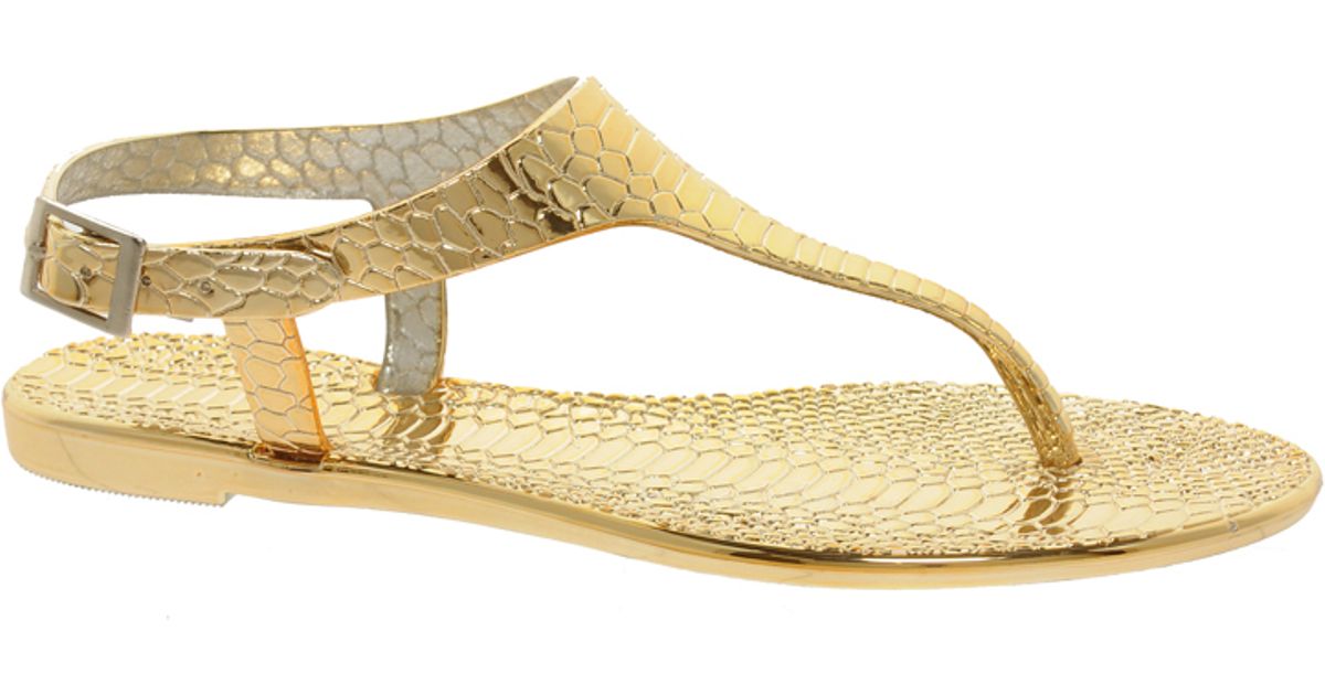 gold jelly sandals