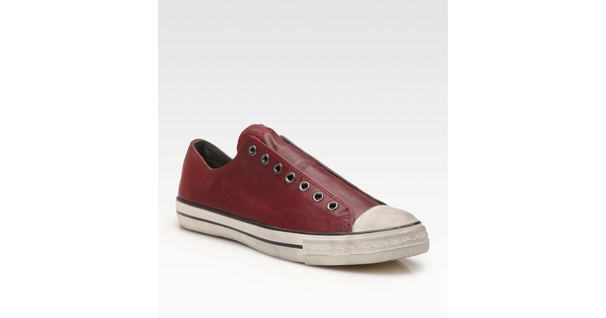 red laceless converse