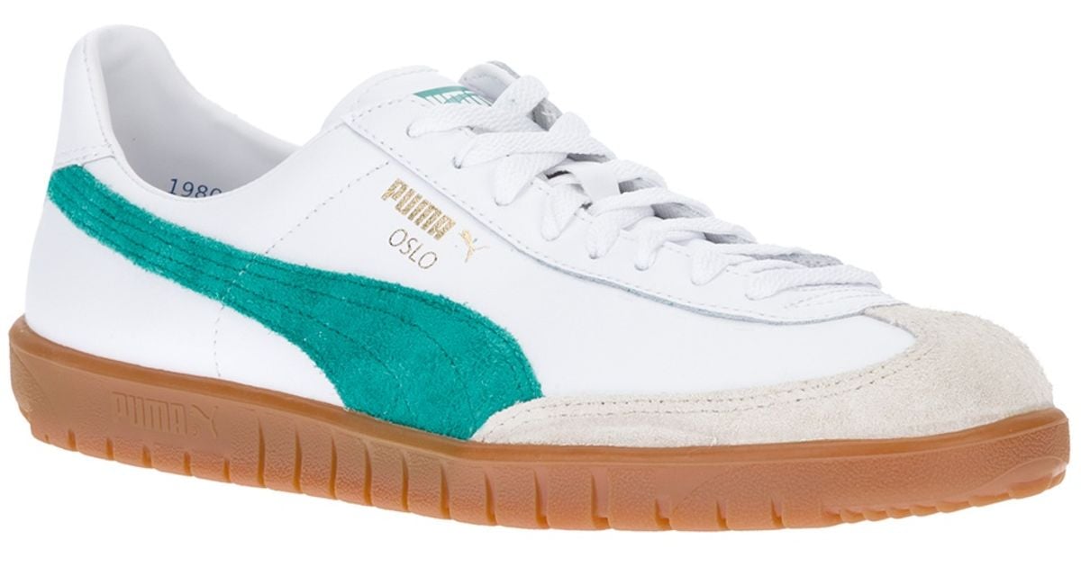 puma oslo pro leather trainer in white and green