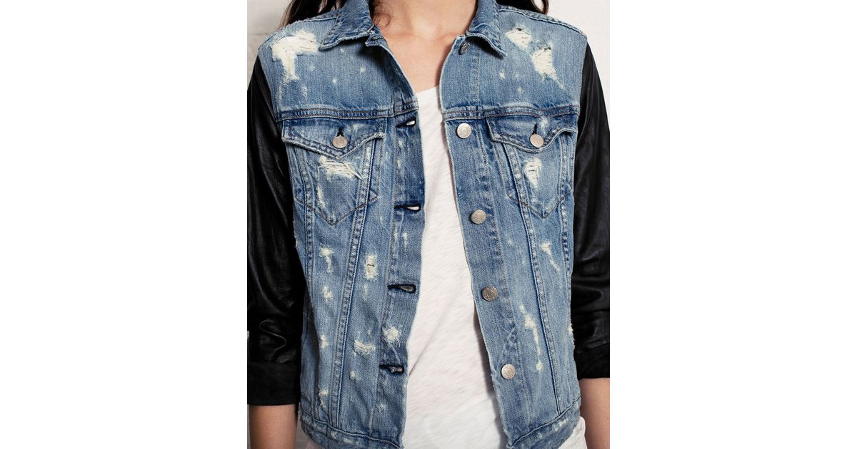 tattered denim jacket