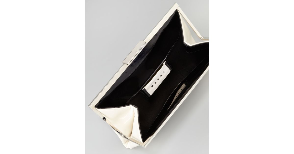 pale grey patent clutch bag