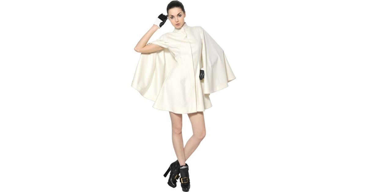 white cape coat