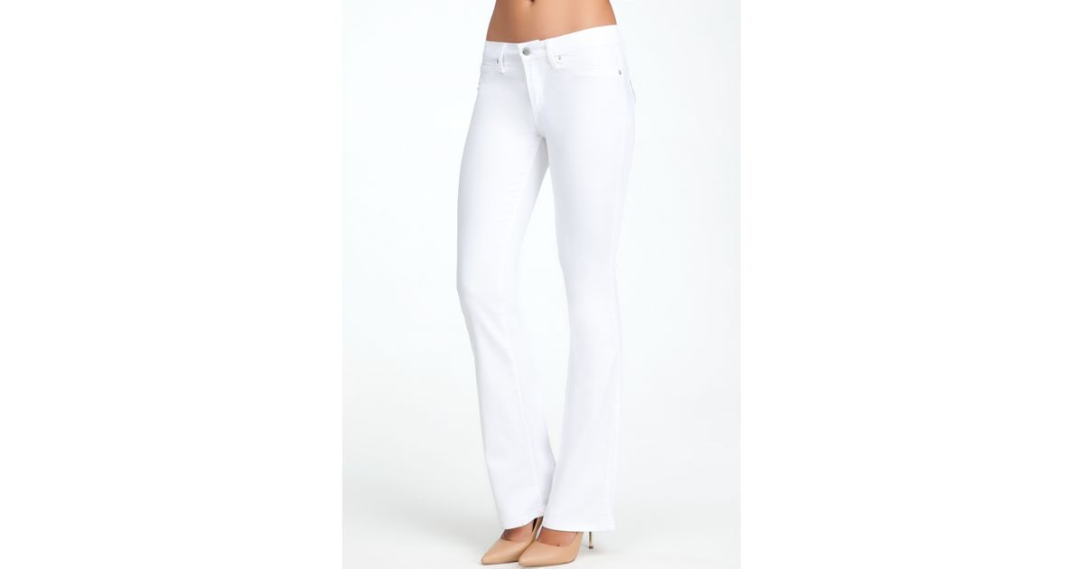 Bebe Flap Pocket Bootcut Jeans in White 