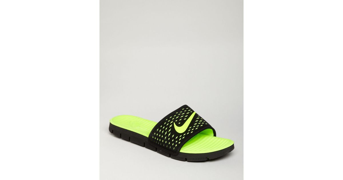 nike green flip flops