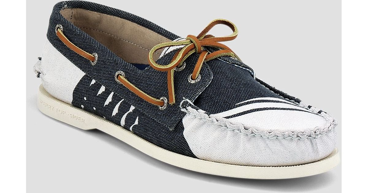 sperry white canvas shoes