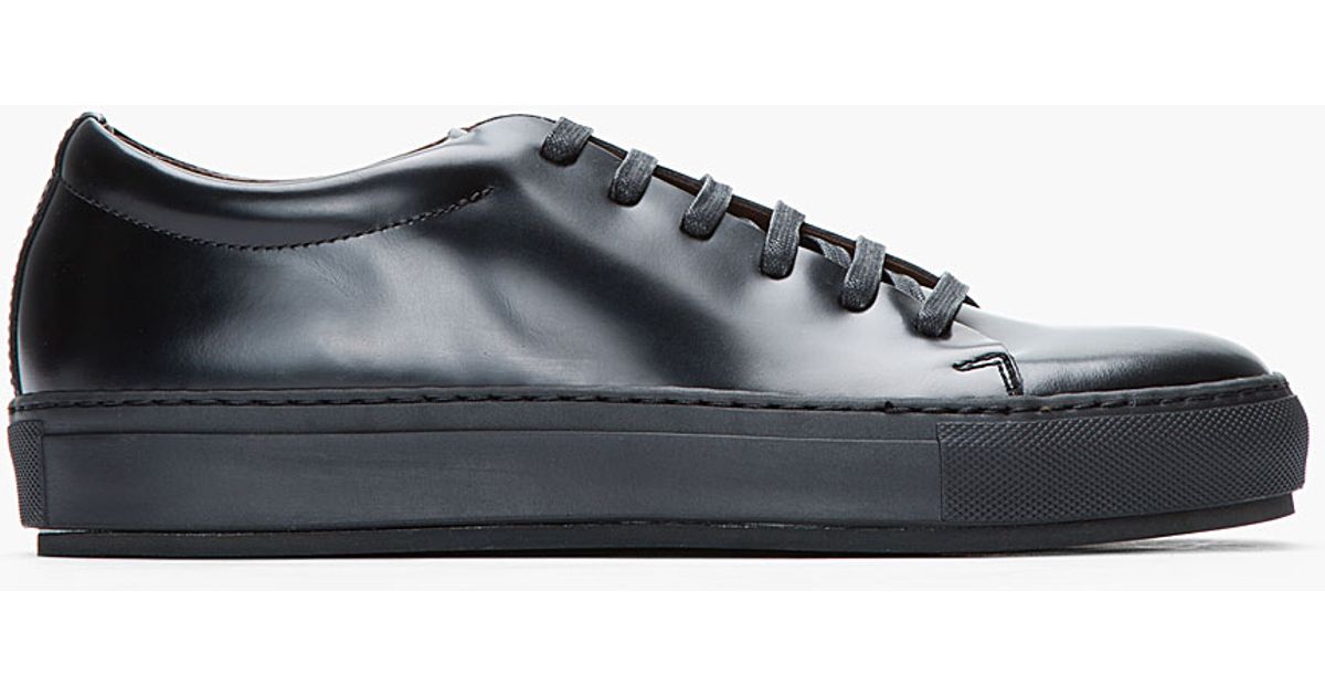 black glossy sneakers