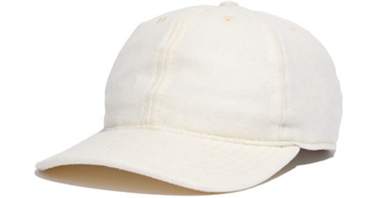 cream baseball cap