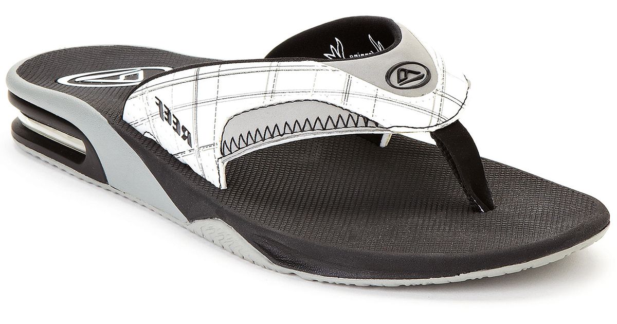 white reef flip flops