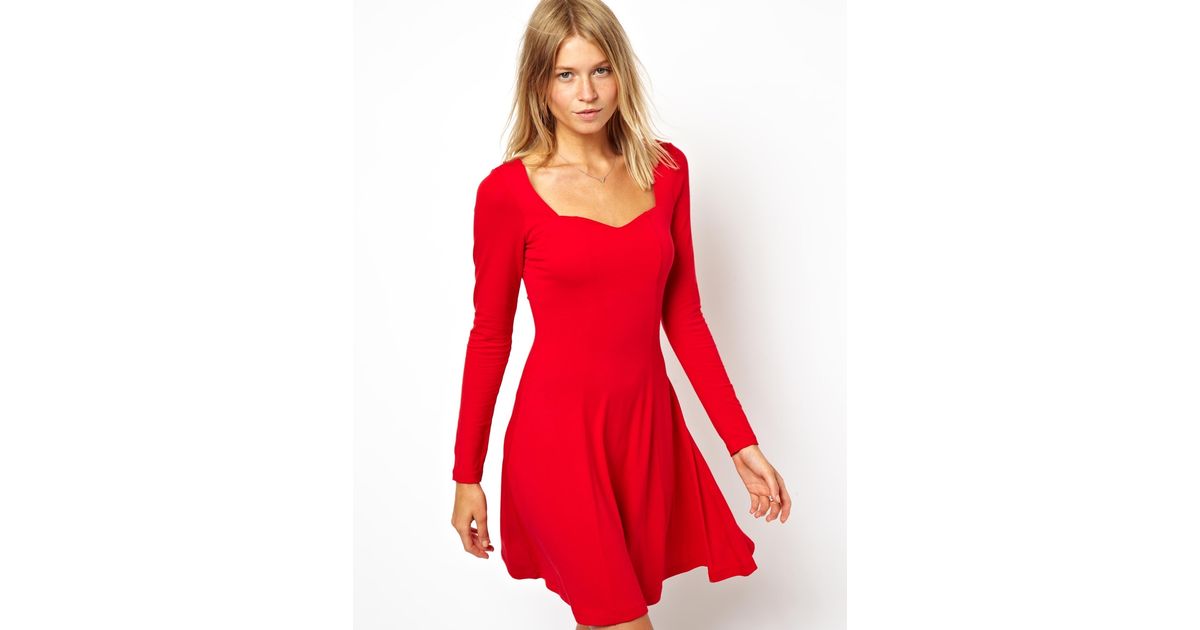 red skater dress with sweetheart neckline
