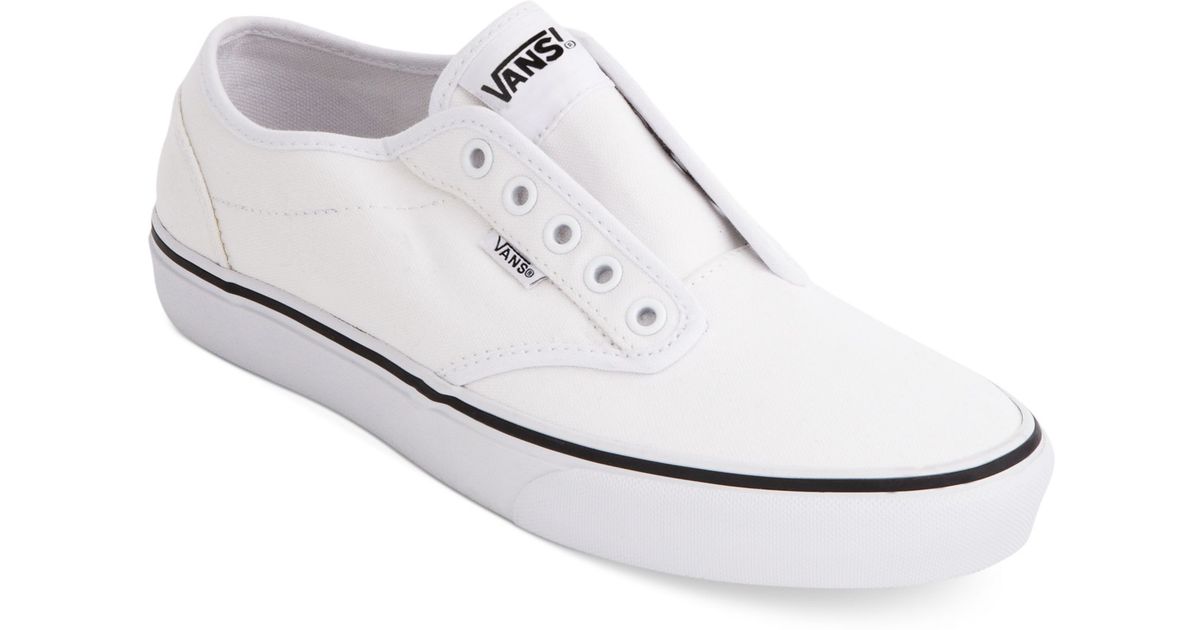 white laceless canvas shoes