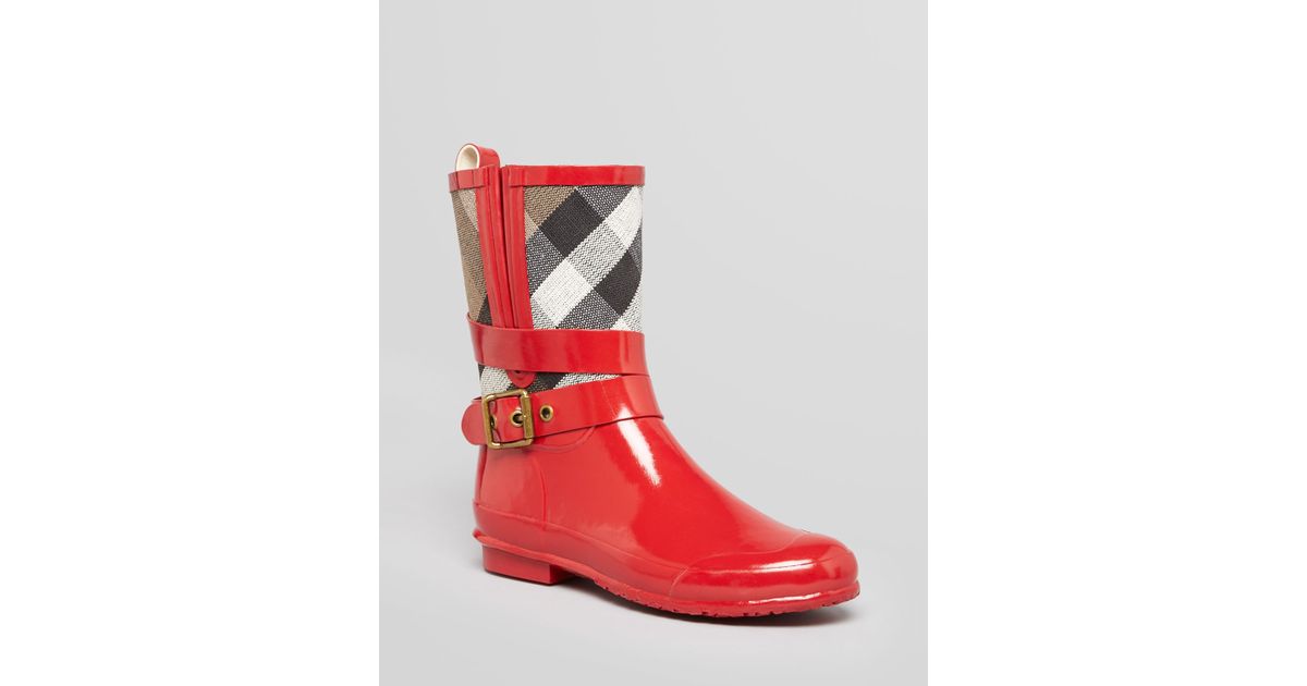 red burberry rain boots