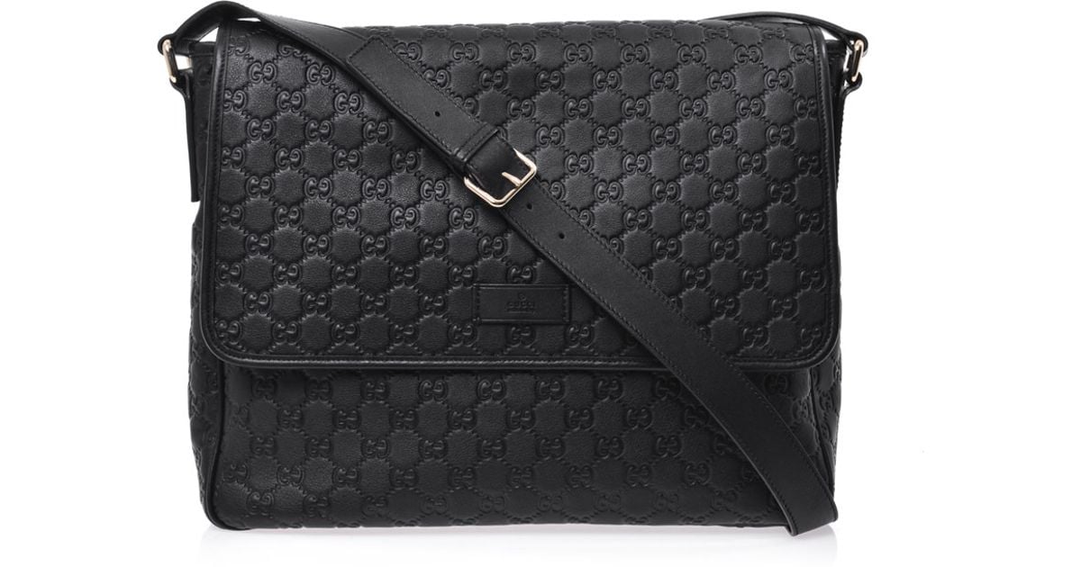 Gucci GG Embossed Leather Messenger Bag in Black for Men | Lyst
