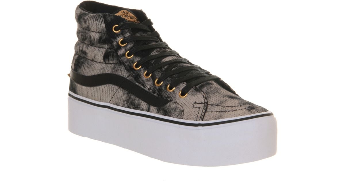 black and gray high top vans