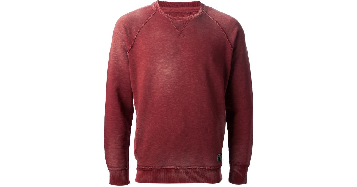 faded red sweatshirt