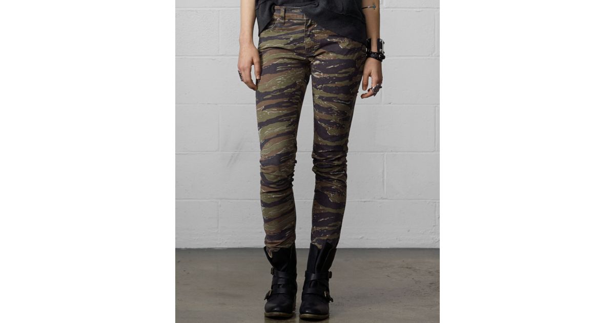 camo skinny jeans with ankle zipper