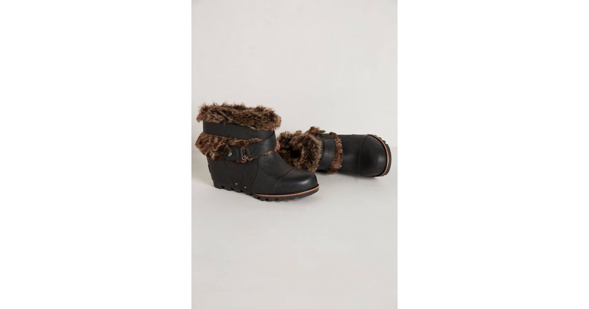 black sorel wedges