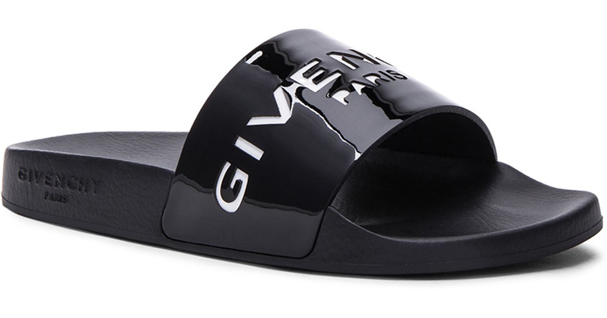 black patent sliders