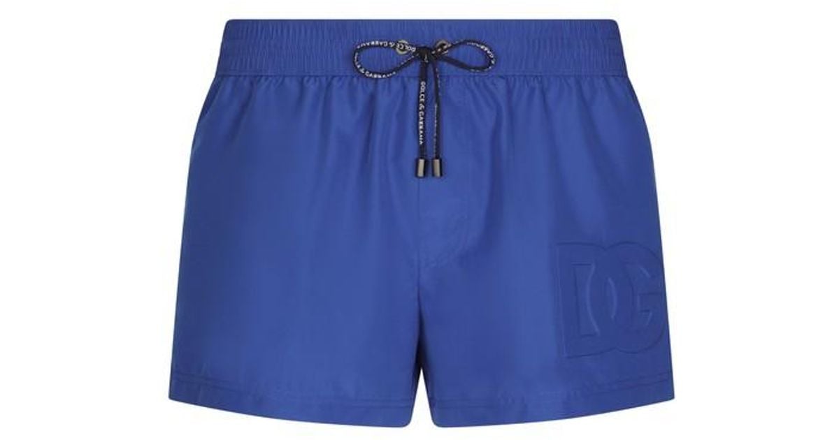 Dolce & Gabbana Short Swim Trunks With Embossed Dg Logo in Blue for Men |  Lyst Canada
