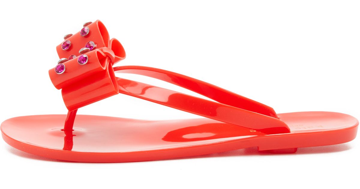 red jelly flip flops