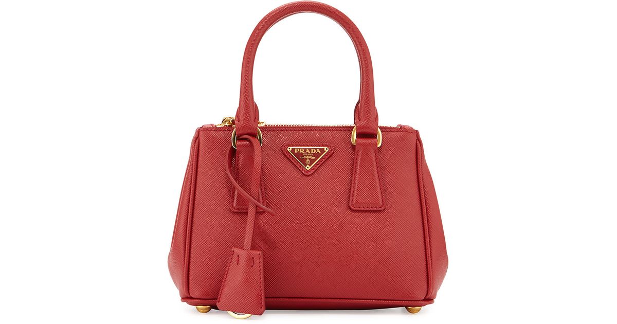 Lyst Prada Saffiano Extra Mini Executive Leather Bag In Red