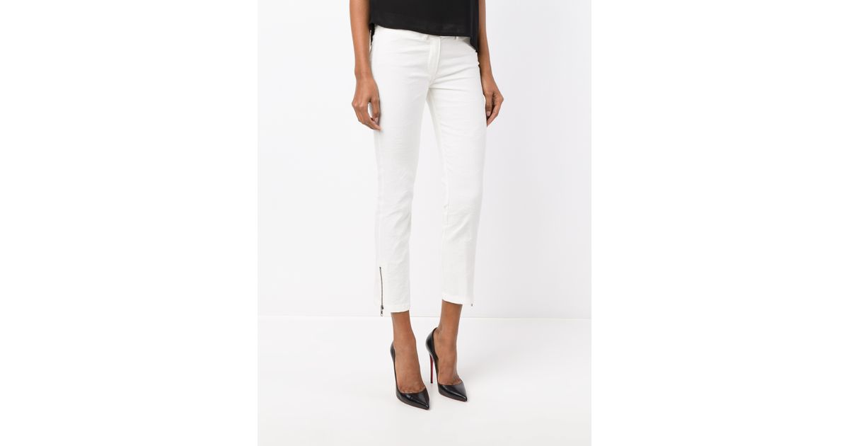 cream slim trousers