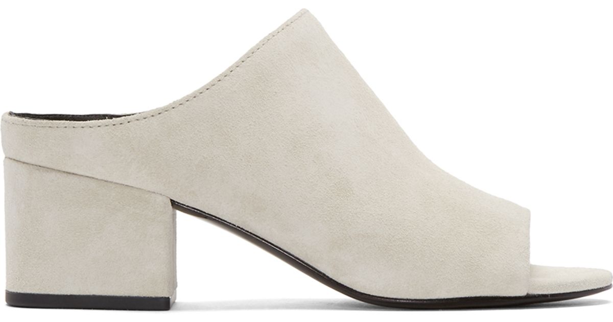 white suede mules